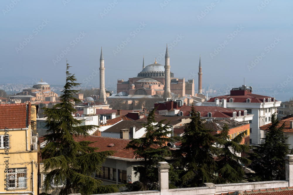 Fototapeta premium View of the Hagia Sophia Grand Mosque from the roof of a house on a sunny day, Istanbul, Turkey