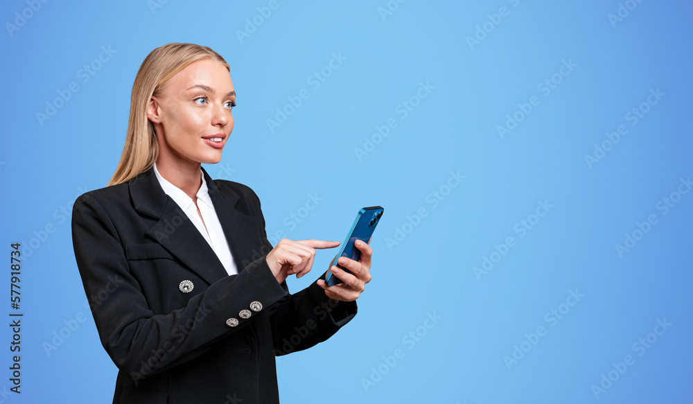 Businesswoman using phone, happy portrait and empty blue copy space background Businesswoman using phone, happy portrait and empty blue copy space background