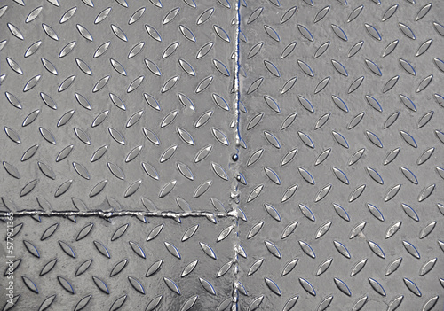 Εκτύπωση καμβά Close-up of the texture of a corrugated steel sheet. Weld seam.