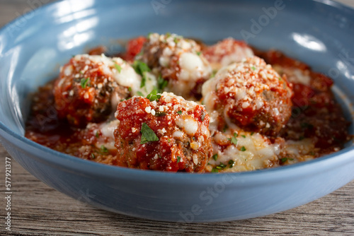 A closeup view of a plate of meatballs.