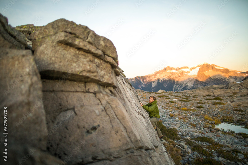 Man rock climbing in the Coast Mountains, B.C. Man rock climbing in the Coast Mountains, B.C.