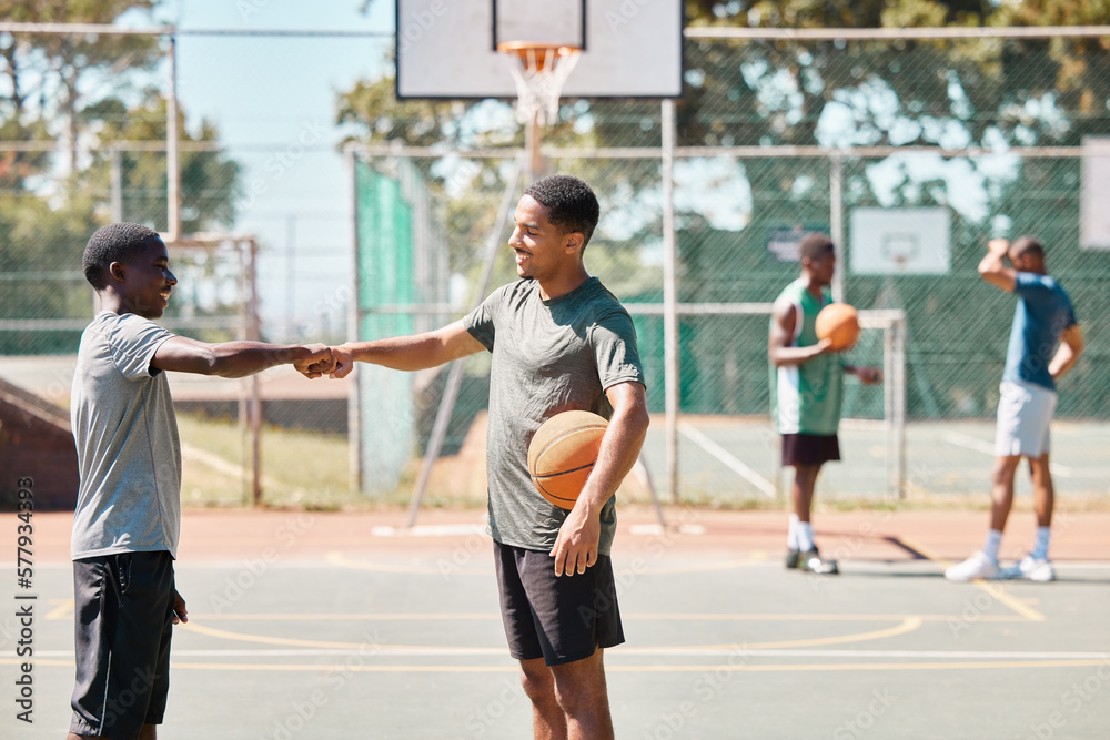 Teamwork, sports and fist bump with man on basketball court for fitness, support and friends. Goals, partnership and community with basketball player training for workout, exercise and energy