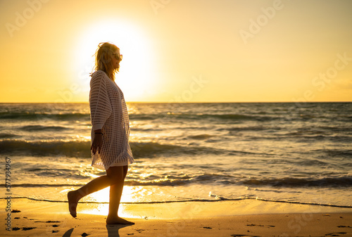 Beach holiday - beautiful woman walking on sunny, tropical beach   © Jacek Chabraszewski