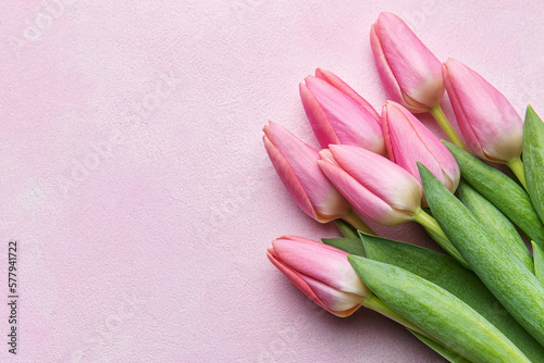 Fototapeta Naklejka Na Ścianę i Meble -  Bouquet of pink tulips on pink background.