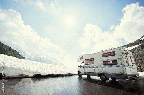 A camper with the glacier in the background, Alps mountains, Switzerland.