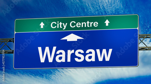 Road sign indicating direction to the city of Warsaw