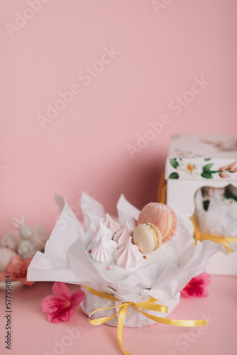 easter cake surrounded with eggs and flowers
