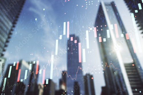 Fotografie Multi exposure of abstract financial graph on office buildings background, forex