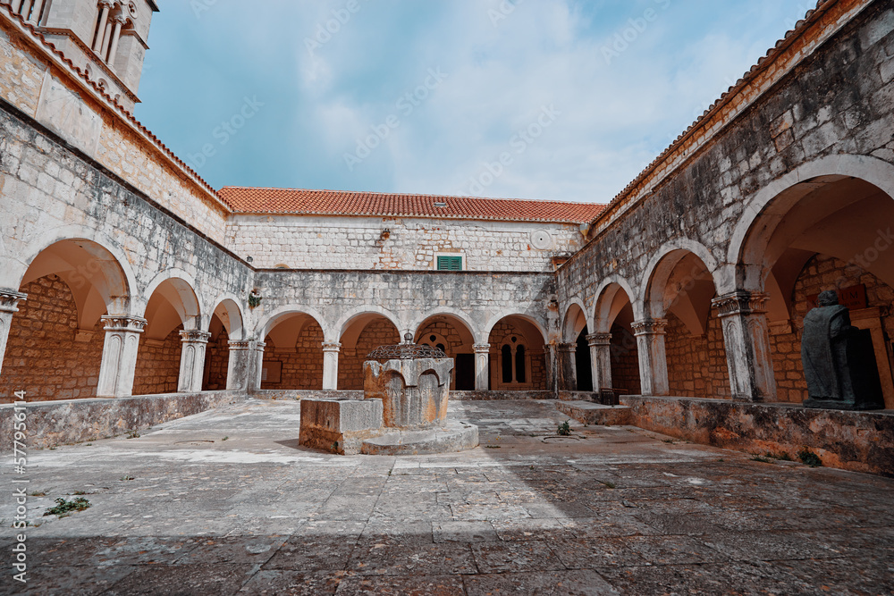 Ancient catholic architecture. The courtyard of  Franciscan Monastery in Hvar, Croatia.