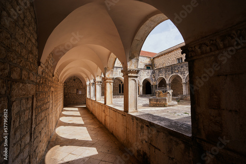Ancient catholic architecture. The courtyard of  Franciscan Monastery in Hvar, Croatia. photo