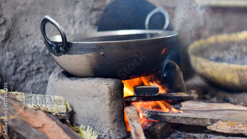 Cooking Pan over wooden fire used to cook food at village in India
