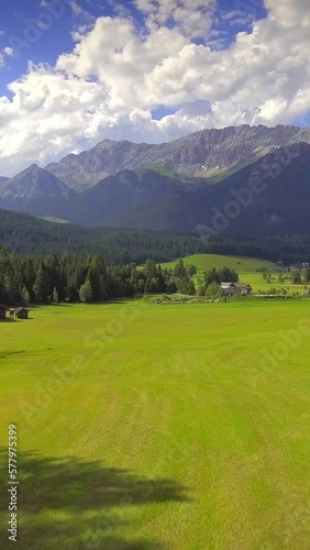 Wallpaper Mural Beautiful green nature, touristic destination, Alps, vertical short video, aerial Torontodigital.ca