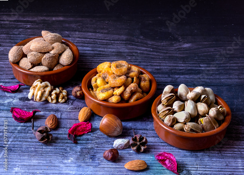 Beautiful group of almonds, quicos and pistachios, inside their shells. photo