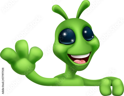 An alien cute little green man Martian cartoon mascot peeking over a sign and waving