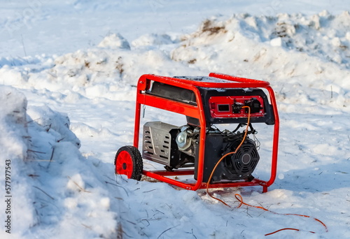 Diesel generator close-up on the background of snow in winter
