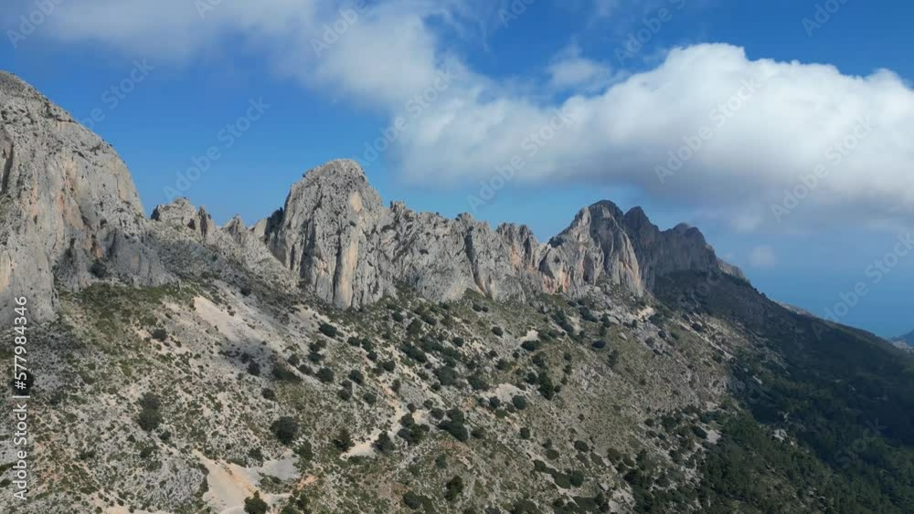 Flying above the clouds,a drone's view of Serra de Bèrnia.Sierra de Bernia in Alicante,Spain. Drone video 4K Flying above the clouds,a drone's view of Serra de Bèrnia.Sierra de Bernia in Alicante,Spain. Drone video 4K