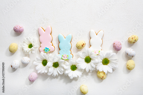 Overhead view of Easter bunny cookies holiday concept chocolate eggs