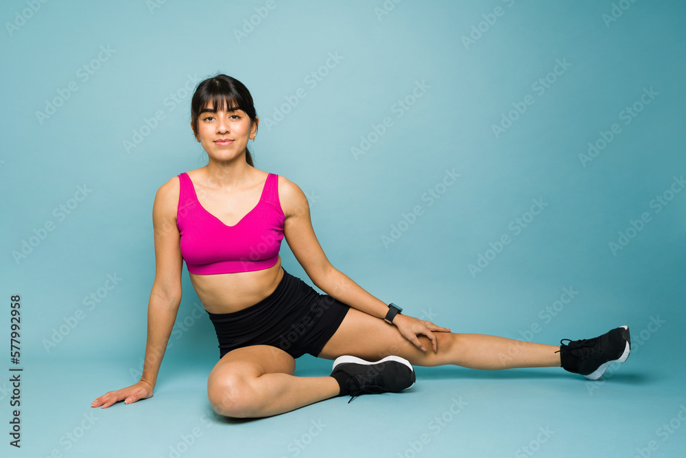 Attractive young woman in sportswear smiling Attractive young woman in sportswear smiling