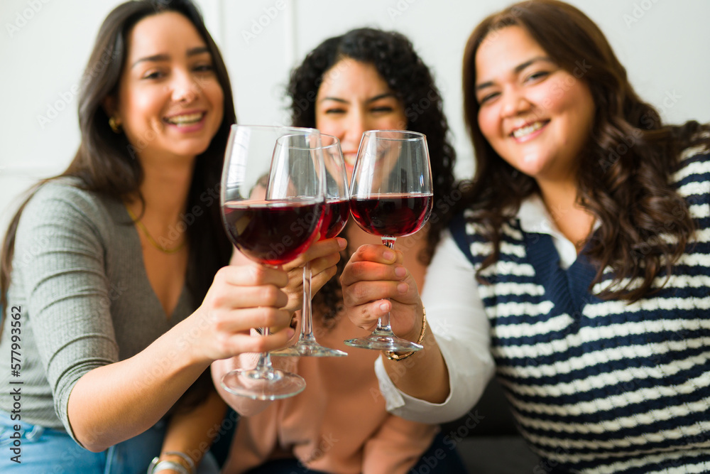Cheerful friends drinking wine having fun Cheerful friends drinking wine having fun