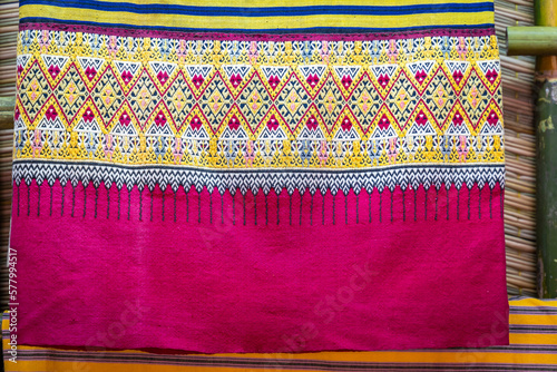 Beautiful colorful traditional textile is woven local fabrics with unique craftsmanship famous sarong of people in Mae Chaem district Chiang Mai, Thailand.