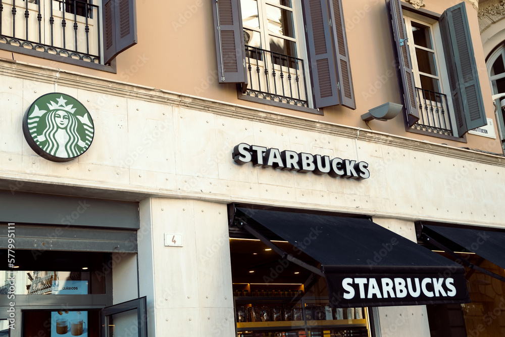 Malaga, Spain - March 05, 2023: Logo of Starbucks Coffee Shop. American  famous brand for coffee. Stock Photo