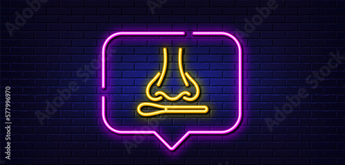 Neon light speech bubble. Nasal swab test line icon. Nose with cotton swab sign. Coronavirus testing symbol. Neon light background. Nasal test glow line. Brick wall banner. Vector