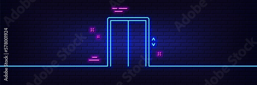 Neon light glow effect. Lift line icon. Elevator sign. Transportation between floors symbol. 3d line neon glow icon. Brick wall banner. Lift outline. Vector