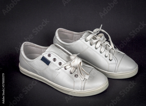 Stock leather sneakers with soles without logo. new style for women. white