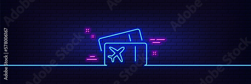 Neon light glow effect. Boarding pass line icon. Airplane tickets sign. Check in flight symbol. 3d line neon glow icon. Brick wall banner. Boarding pass outline. Vector