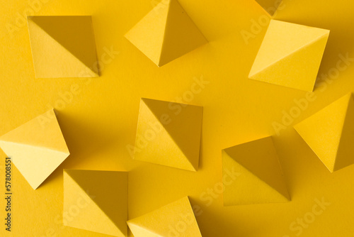 Abstract yellow background with triangle shapes