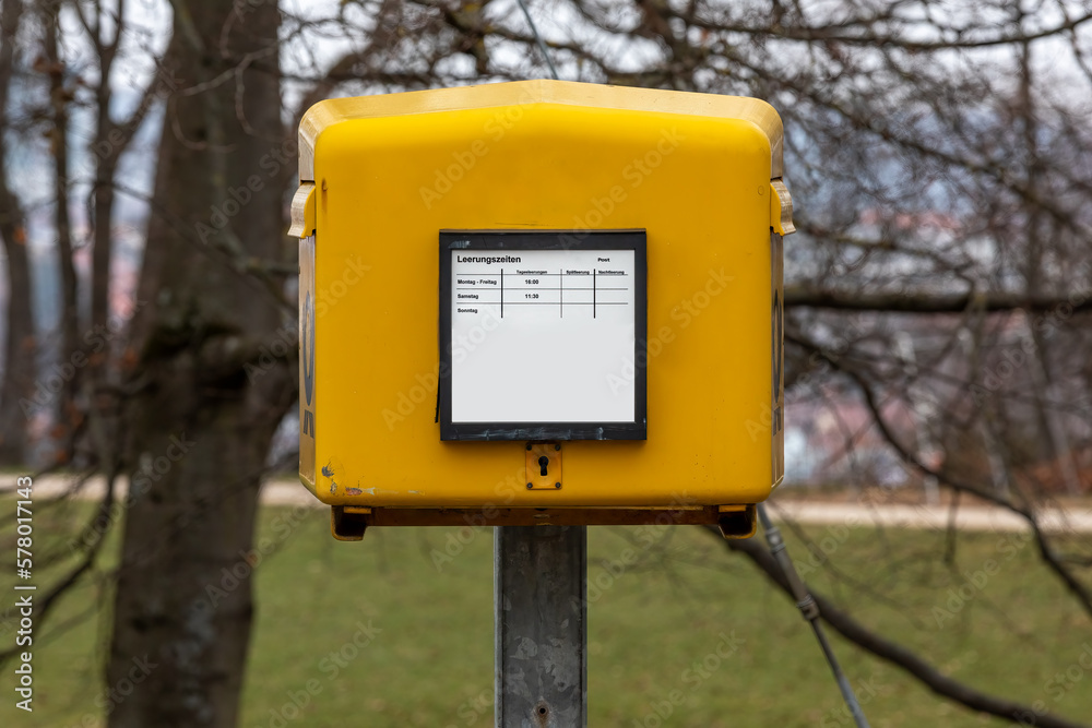 Yellow Mailbox from the German Post - Traditional and Reliable Postal Service Yellow Mailbox from the German Post - Traditional and Reliable Postal Service