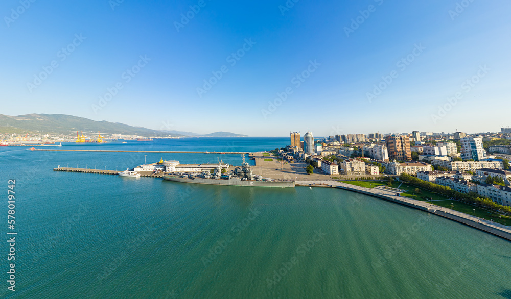Novorossiysk, Russia - September 16, 2020: Central part of the city. Port in the Novorossiysk Bay. Cruiser 