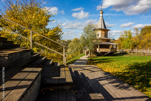 Wooden architecture with an Orthodox church in the countryside. Rusinovo, Borovsky district, Kaluzhskiy region, Russia