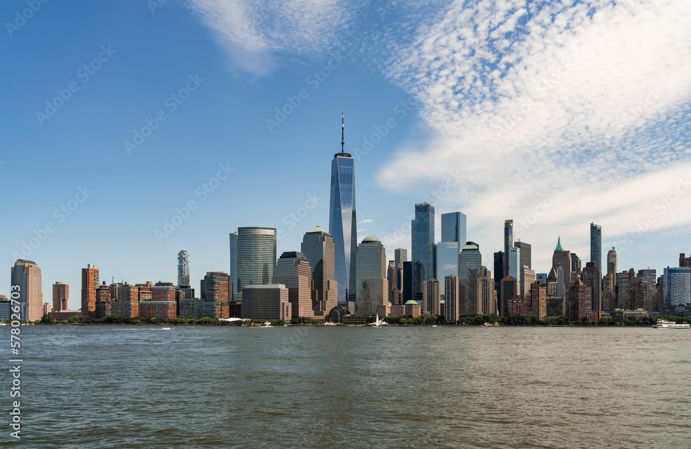 New York City skyline, lower Manhattan skyscrapers under cloudy sky