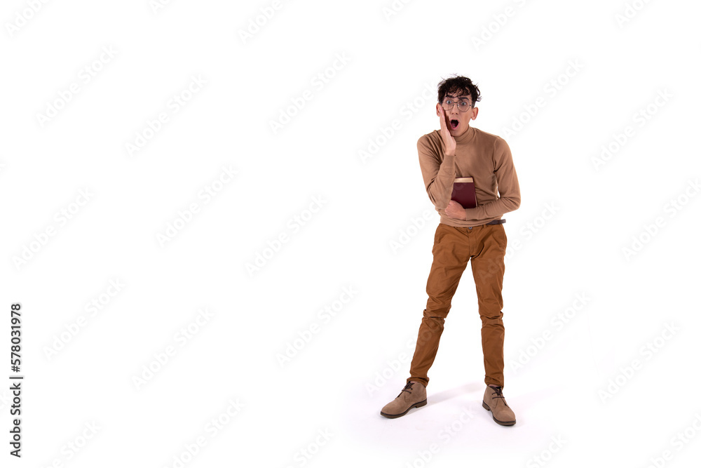 Cheerful attractive student. Guy with textbooks on a white background. Cheerful attractive student. Guy with textbooks on a white background.