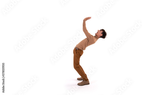 Funny guy is dancing on a white background. Human emotions. Isolate.