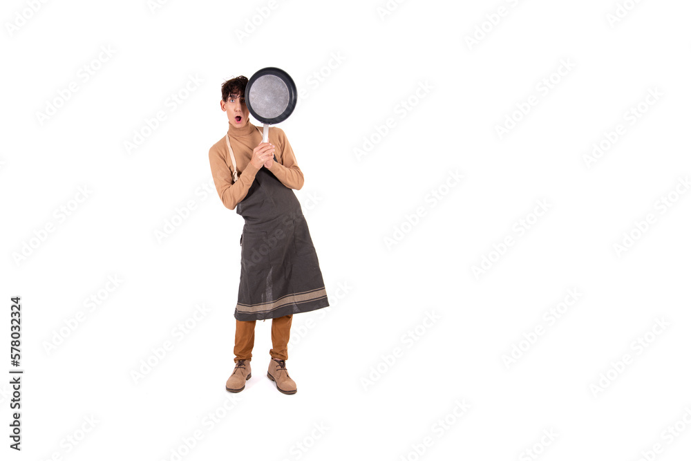 Cheerful attractive chef. Guy with a frying pan on a white background. Cheerful attractive chef. Guy with a frying pan on a white background.