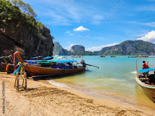 Thailand - January 2023: Thai traditional tourist boats off the coast of Koh Tapu island