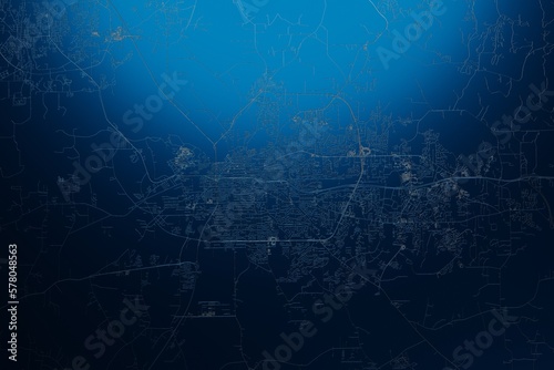 Street map of Montgomery (Alabama, USA) engraved on blue metal background. View with light coming from top. 3d render, illustration