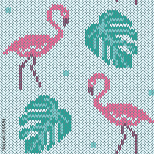 Jacquard knitted seamless pattern. Flamingo and exotic  leaves on light blue background. Vector illustration.