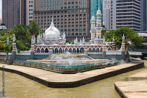 Jamek mosque behind the river in Kuala Lumpur, Malaysia