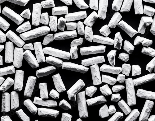 pile of crushed sugar on black background
