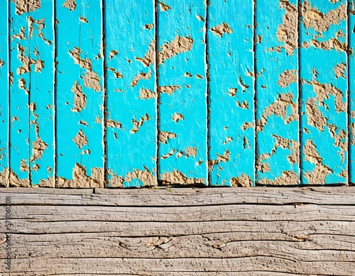 old blue wooden background with peeling paint