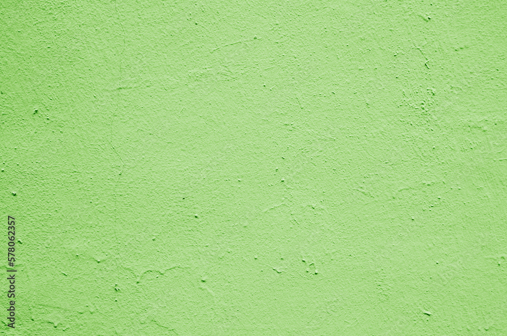 Old peeling paint on the wall..Green abstract background...Background from green stucco. Old peeling paint on the wall..Green abstract background...Background from green stucco.