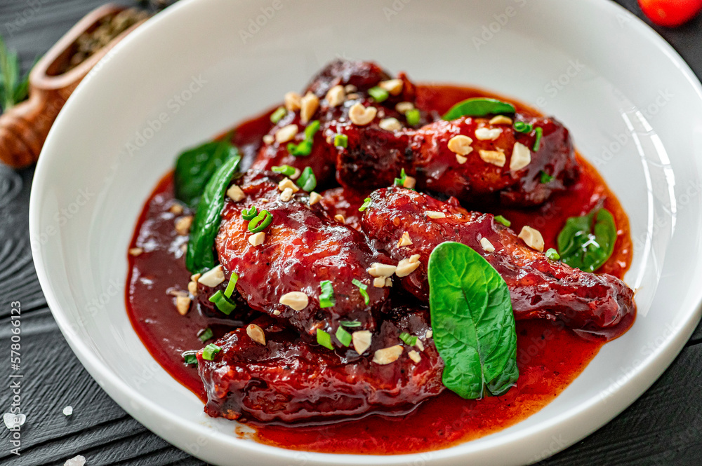 Grilled Chicken Wings with BBQ Sauce and Nuts Grilled Chicken Wings with BBQ Sauce and Nuts