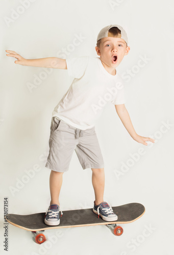little boy skateboarding