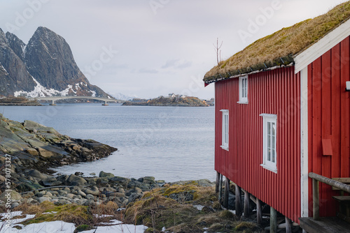 Small red cabin near a fjord in Norway (ID: 578073327)