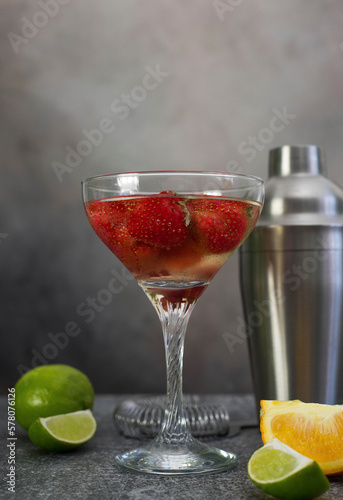 Wallpaper Mural fresh cool strawberry cocktail with champagne with shaker on a gray background. Torontodigital.ca