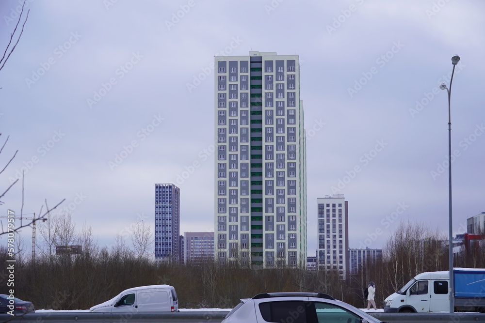 Foto de The multi-story tall building stands out from the others in ...