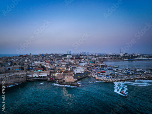 Acre (Akko) is a port city located on the Mediterranean coast and is known for its well-preserved ancient city fortifications. .Aerial footage of the old city, the ancient port and marina.